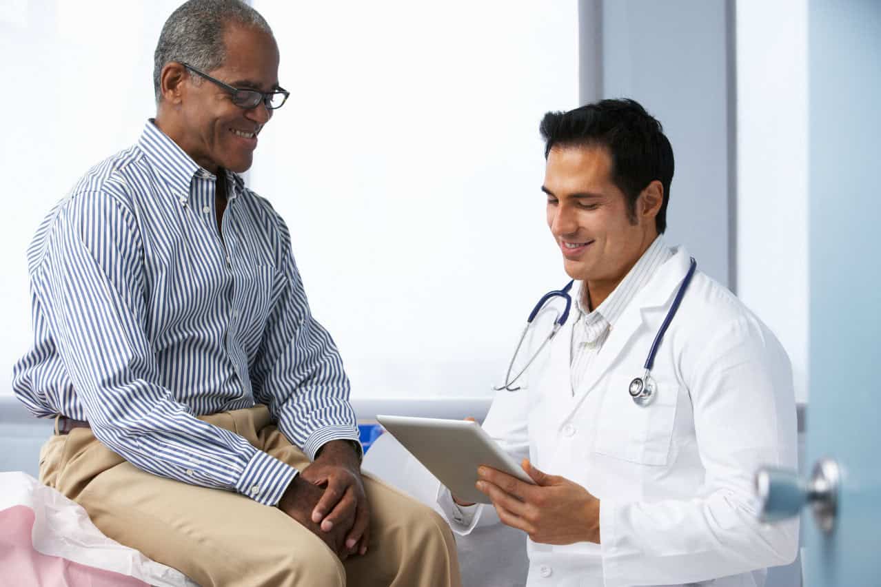 Doctor with older male patient.